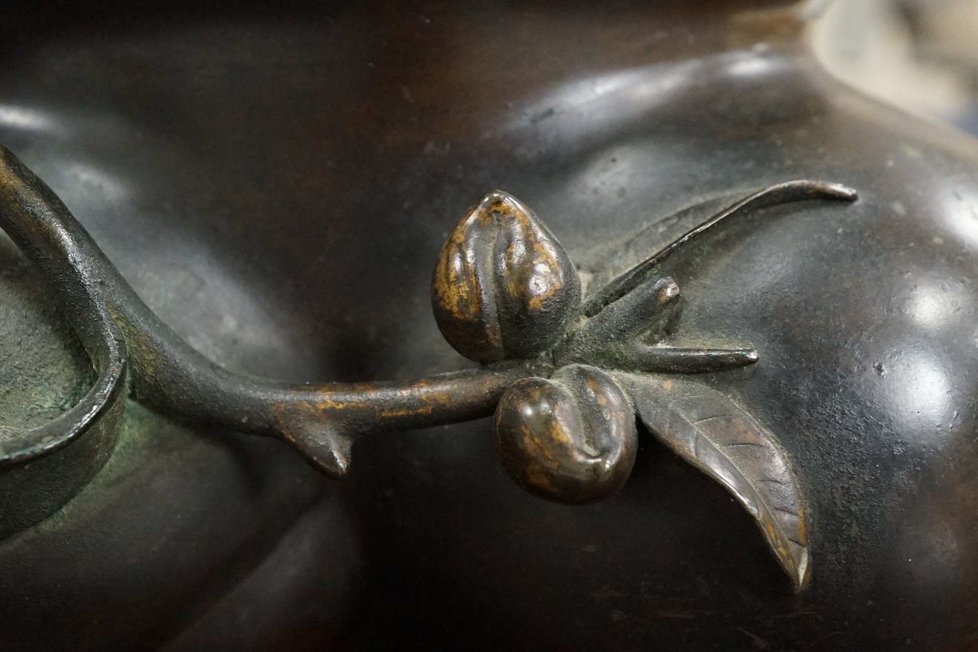 A large Chinese bronze and parcel gilt ‘peach’ censer and cover, Li, 17th/18th century